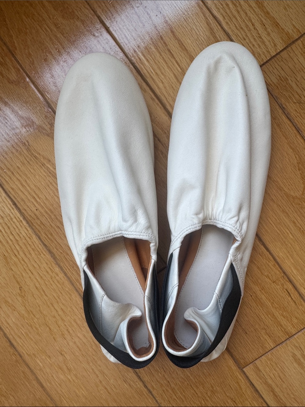 Minimalist White Slip-On Leather Flats